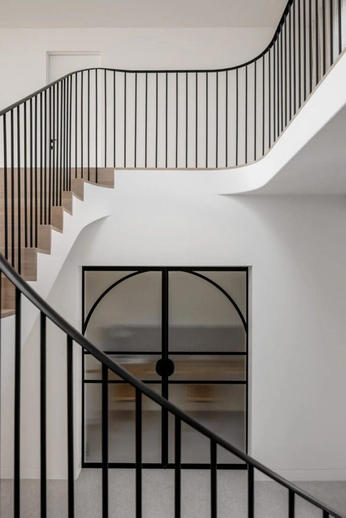 Black steel internal staircase at The Stables Burraneer House