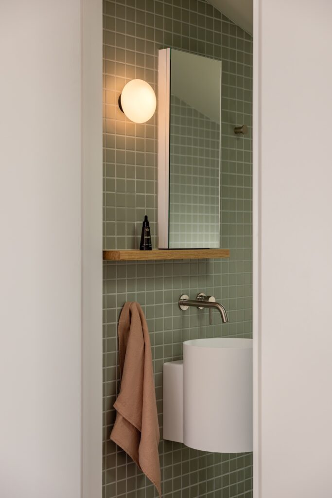 Peeking into green bathroom